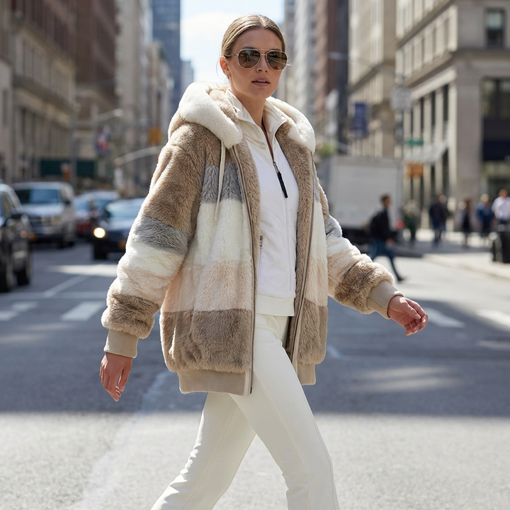 Elegant women's hooded padded winter coat, offering warmth and casual style, ideal for cold seasons.