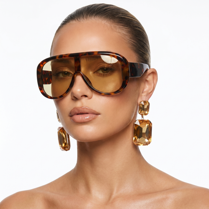 Leopard print women's pilot sunglasses, UV400, a trendy fashion accessory.