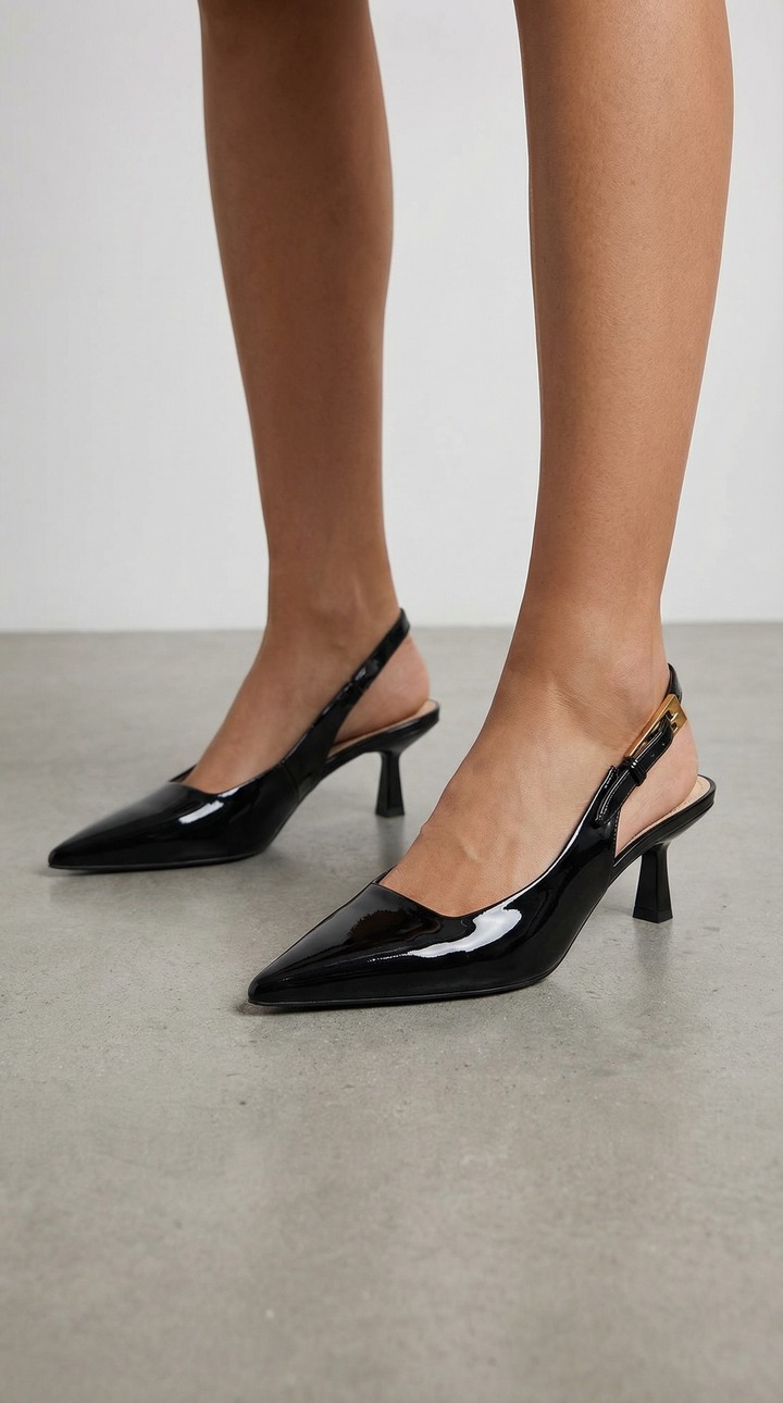 Stylish women's kitten heel slingback pumps with pointed toe for comfortable elegance.