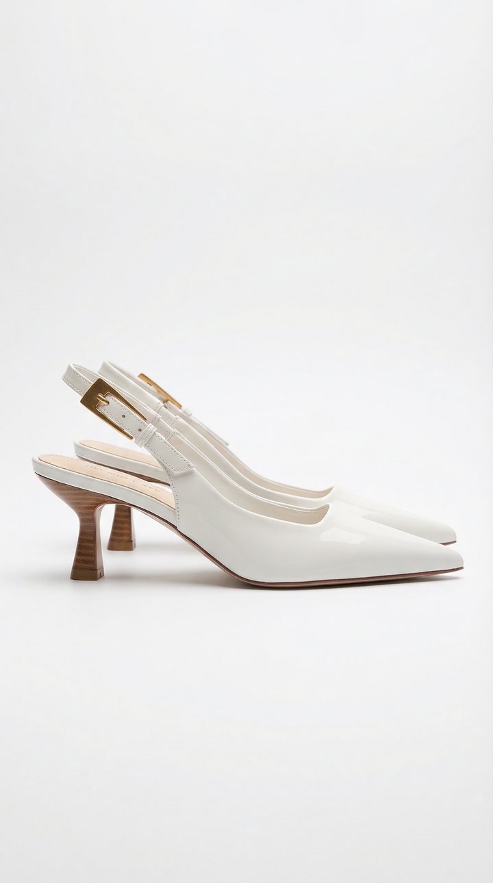 Women's elegant pointed toe kitten heel slingback pumps. Chic dress shoes for any formal event.