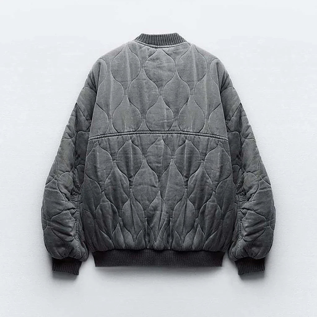 Stylish women's quilted bomber jacket. Ideal fall & winter fashion outerwear for a chic look.