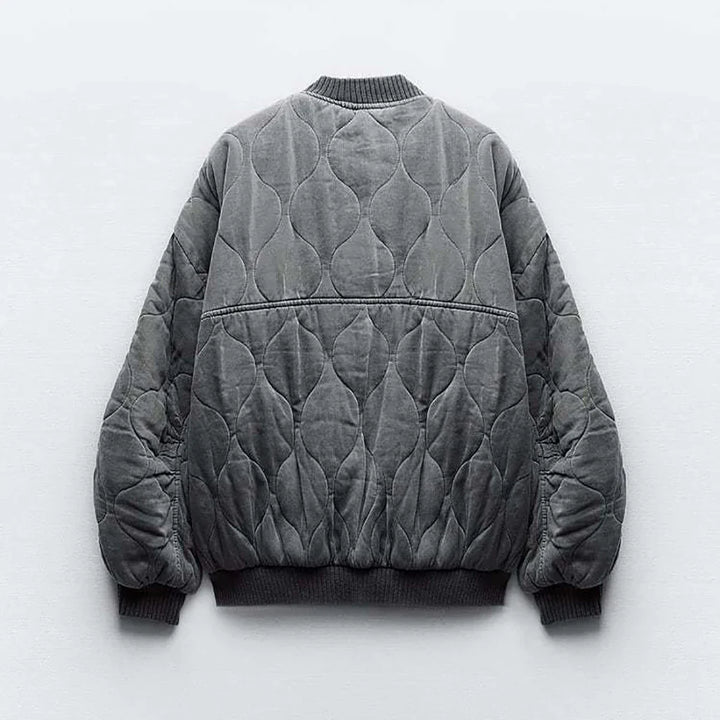 Stylish women's quilted bomber jacket. Ideal fall & winter fashion outerwear for a chic look.
