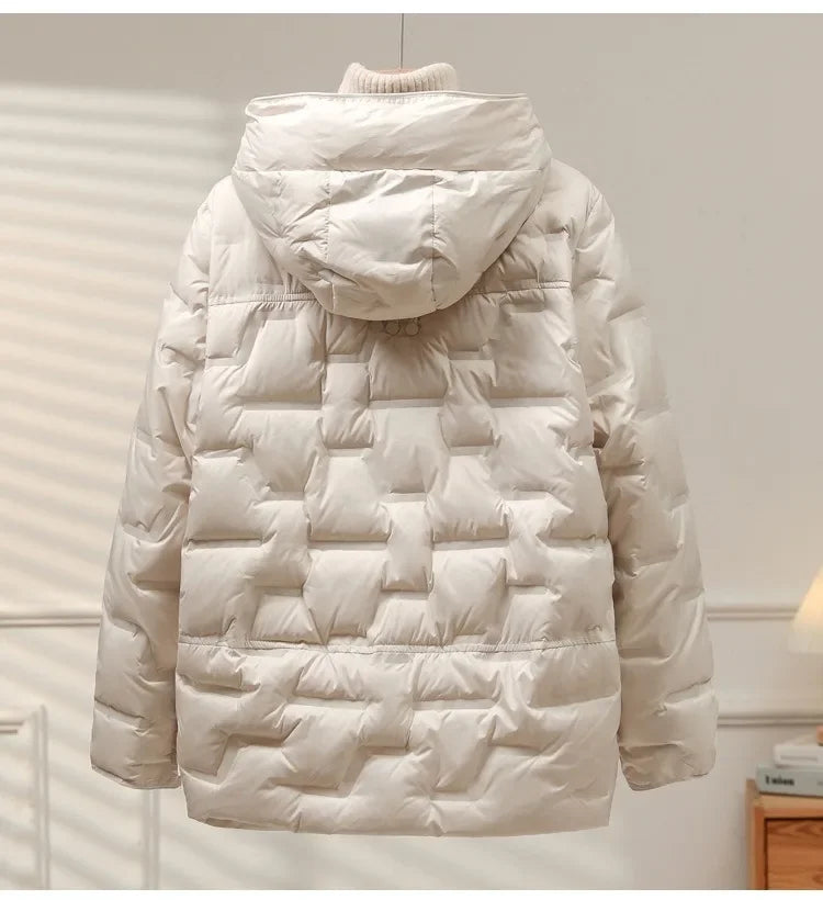 Warm women's quilted puffer jacket, perfect for cold winter days. Stylish & cozy outerwear.