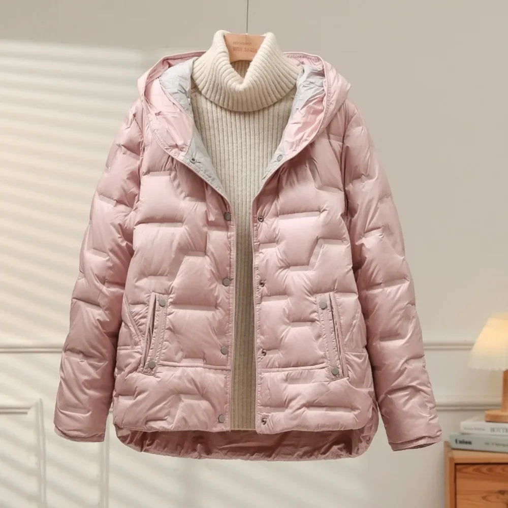 Stylish women's chic quilted puffer jacket, a fashionable winter outerwear piece for layering.