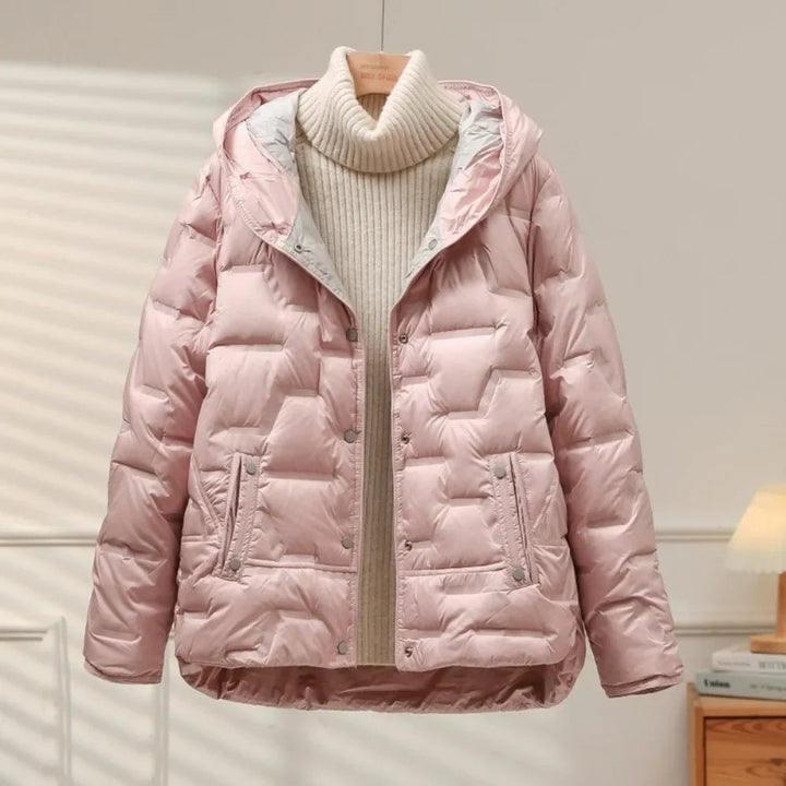 Stylish women's chic quilted puffer jacket, a fashionable winter outerwear piece for layering.