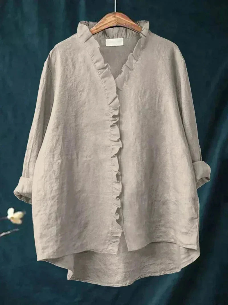 Elegant women's ruffle blouse in a relaxed fit. Perfect for chic style, everyday elegance & French fashion.
