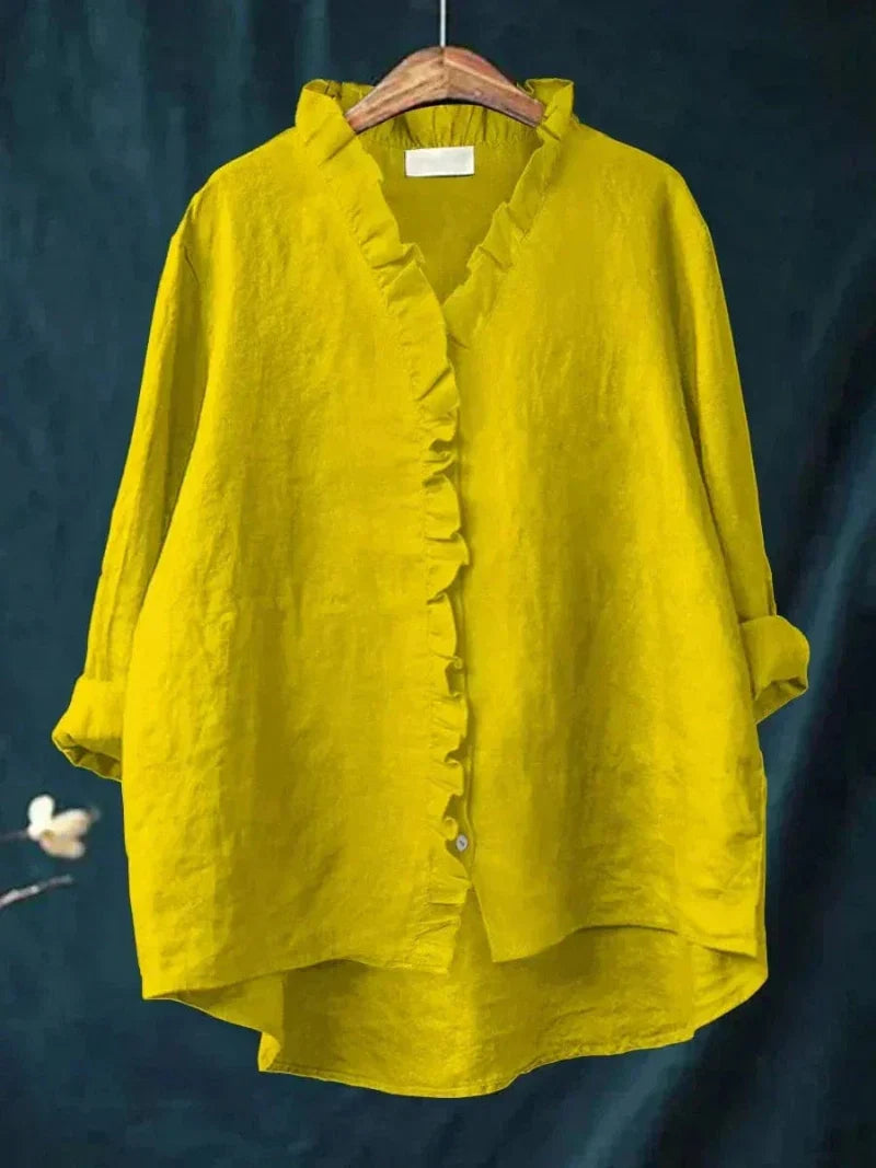 Effortless long sleeve ruffle blouse for women, showcasing delicate ruffles & a relaxed, elegant fit.