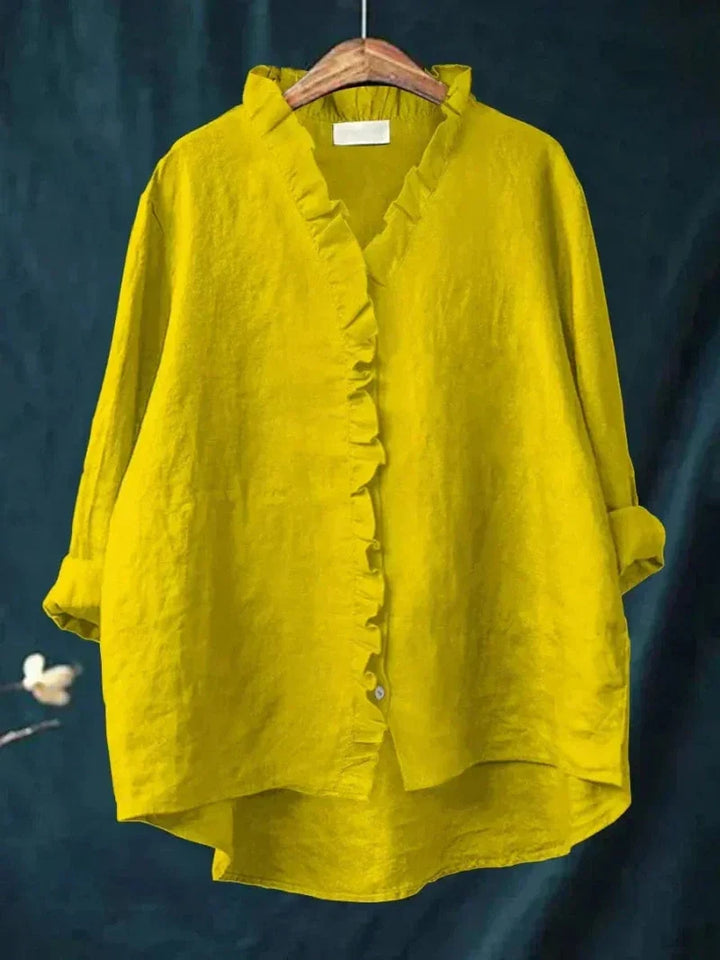 Effortless long sleeve ruffle blouse for women, showcasing delicate ruffles & a relaxed, elegant fit.