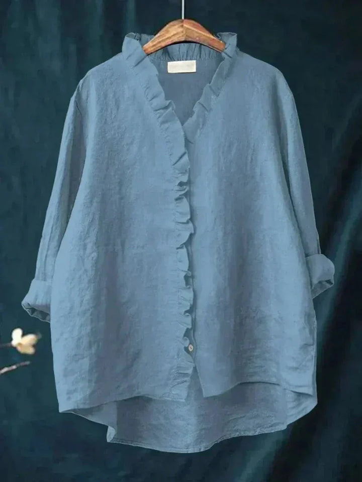 Effortless women's long sleeve ruffle blouse, combining chic style with a relaxed, elegant design.