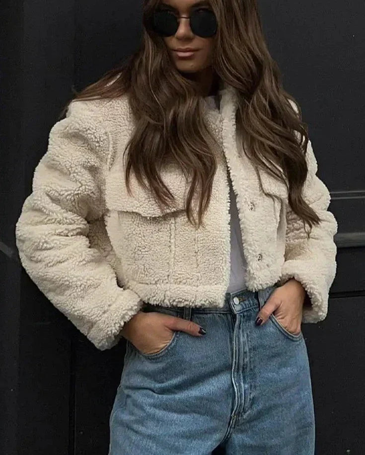 Cozy women's short winter jacket, a stylish outerwear choice. Perfect fall fashion piece, warm for casual everyday wear.