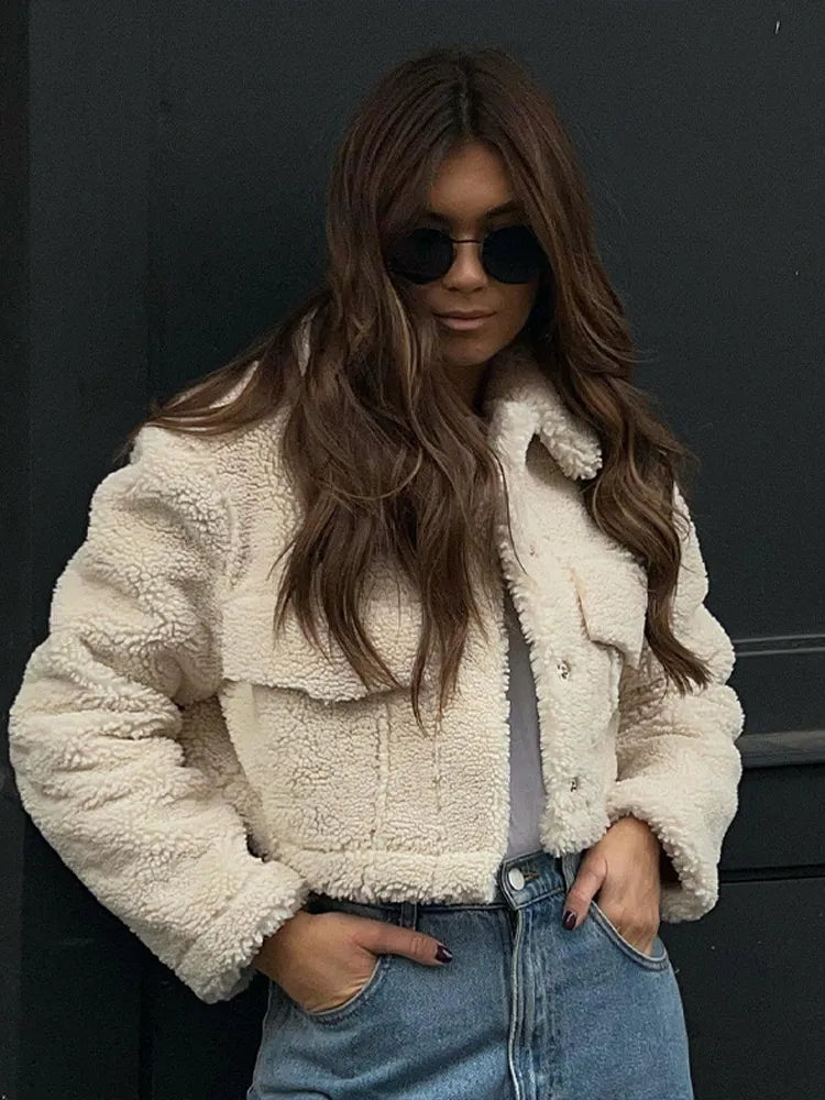 Stylish zip-front women's short winter jacket, ideal for warmth. Chic autumn fashion outerwear for comfortable daily wear.