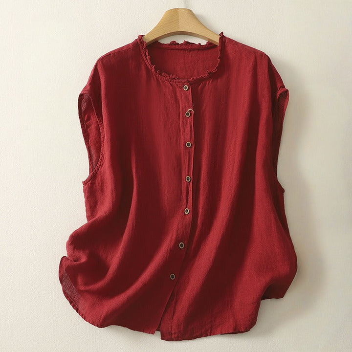 Women's chic sleeveless stand collar blouse, perfect for elegant minimalist fashion and sophisticated style.
