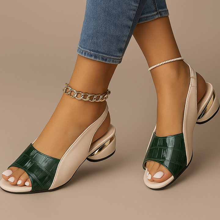 Women's slingback sandals featuring croc texture upper, cushioned sole, comfortable block heel.