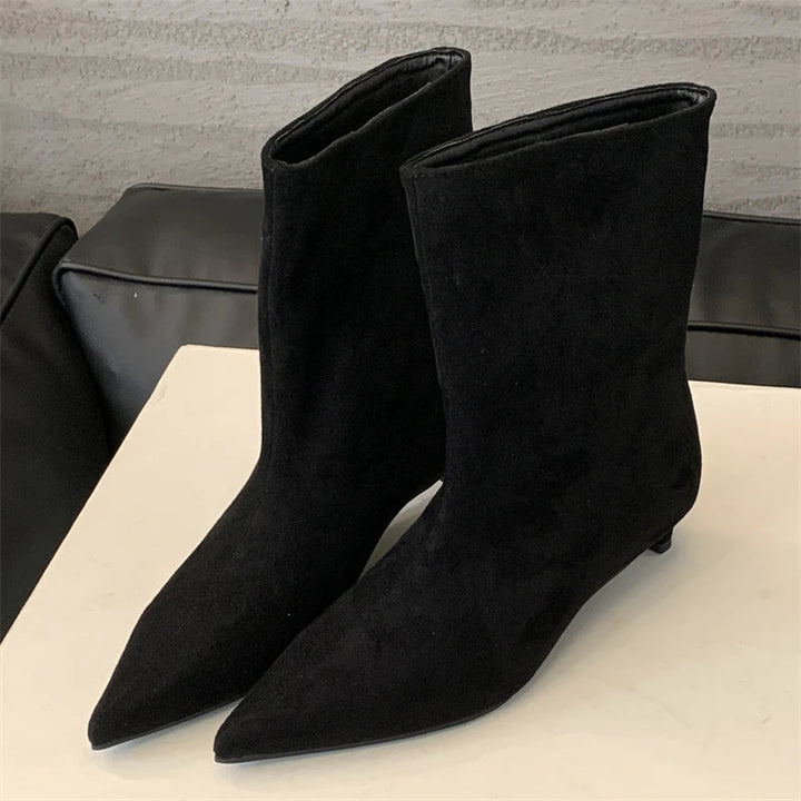 Stylish women's autumn/winter suede ankle boots. Elegant pointed toe and low heel offer versatile chic fashion.