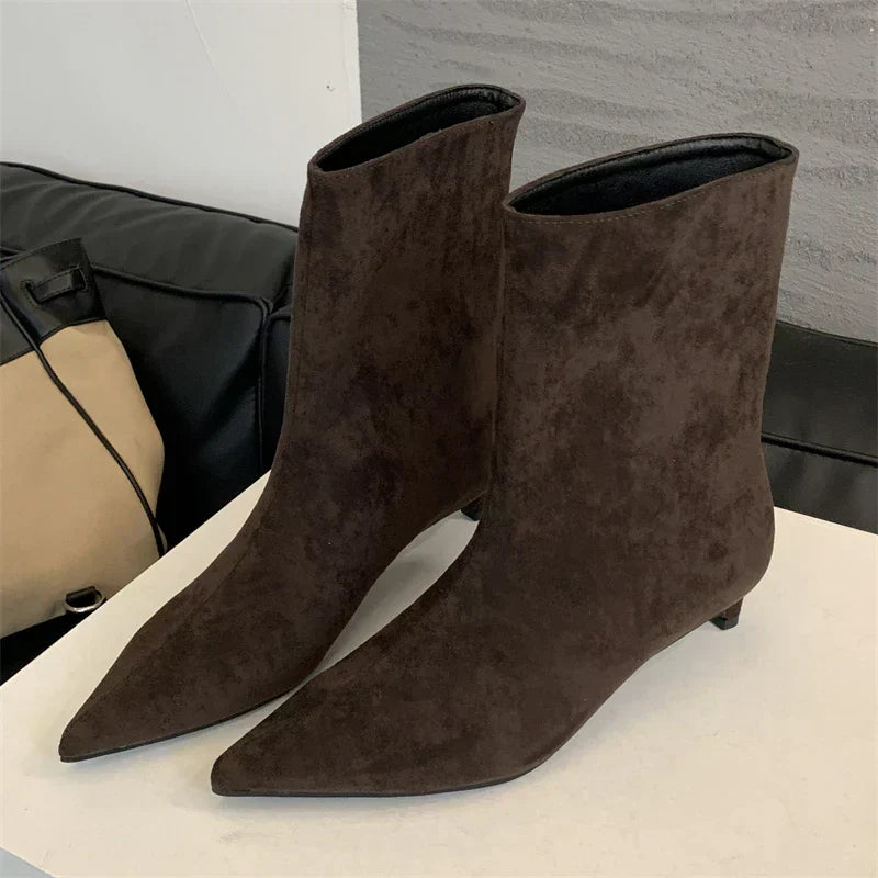 Luxe Sorena women's suede ankle boots. Comfortable low heel, pointed toe for stylish cold weather and winter wear.