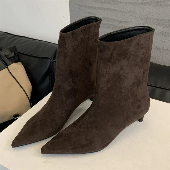 Luxe Sorena women's suede ankle boots. Comfortable low heel, pointed toe for stylish cold weather and winter wear.