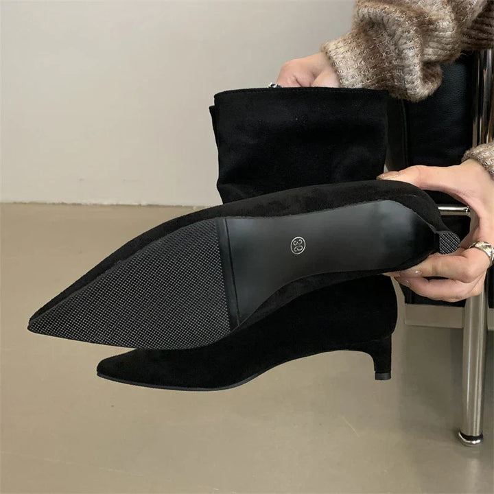Sorena luxe women's suede winter ankle boots. Comfortable, stylish pointed toe and low heel for elegant autumn fashion.