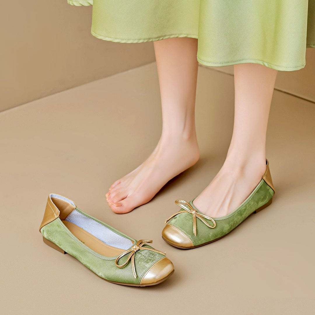 Women's dressy square toe ballet flats with a bow, combining elegance with comfortable design.