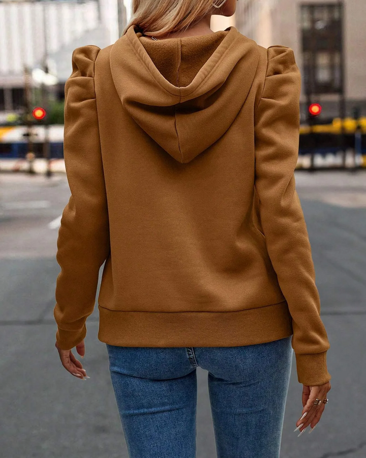 Women's chic stacked sleeve hoodie, a comfortable sweatshirt for fashion-forward casual looks.