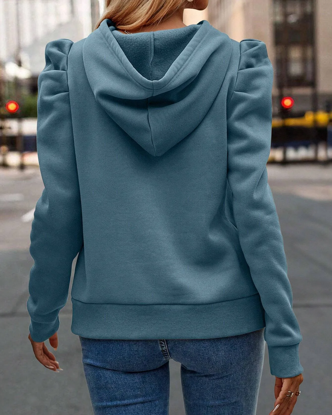 The Women's Chic Stacked Sleeve Hoodie, a fashionable & comfortable women's sweatshirt.
