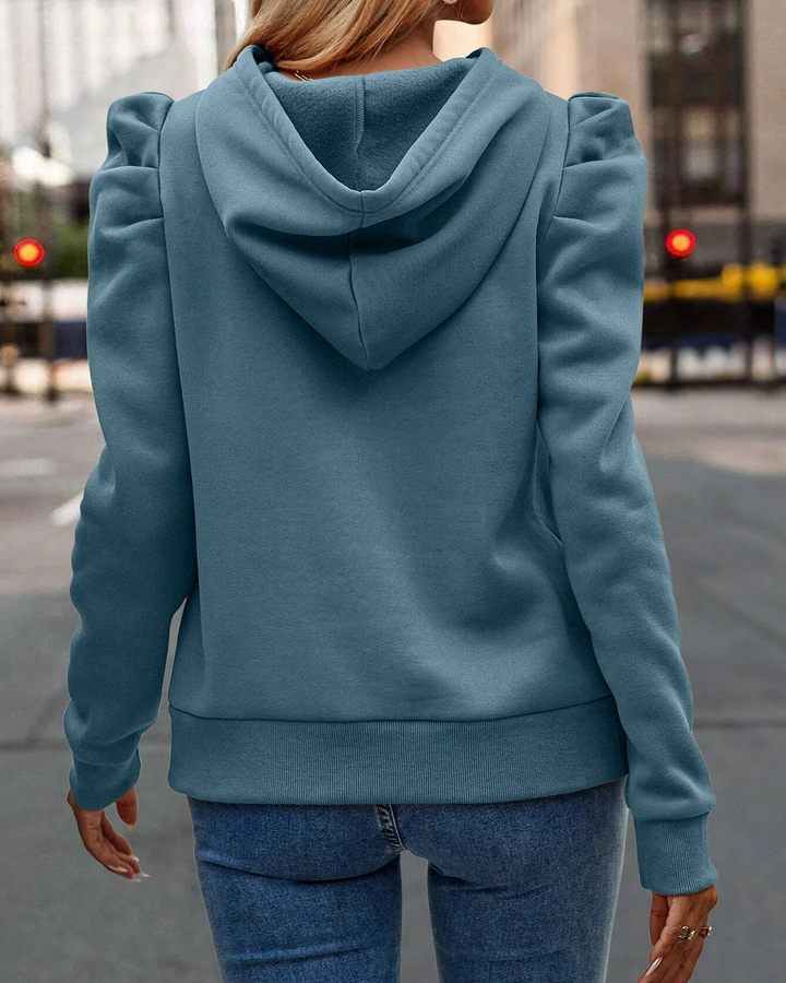 The Women's Chic Stacked Sleeve Hoodie, a fashionable & comfortable women's sweatshirt.