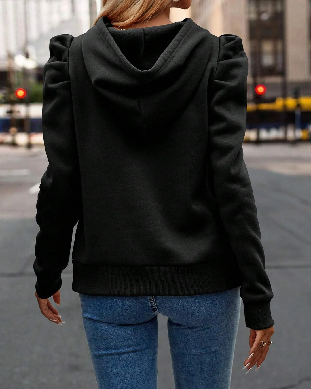 Versatile women's stacked sleeve hoodie, dressed up or down for chic casual looks.