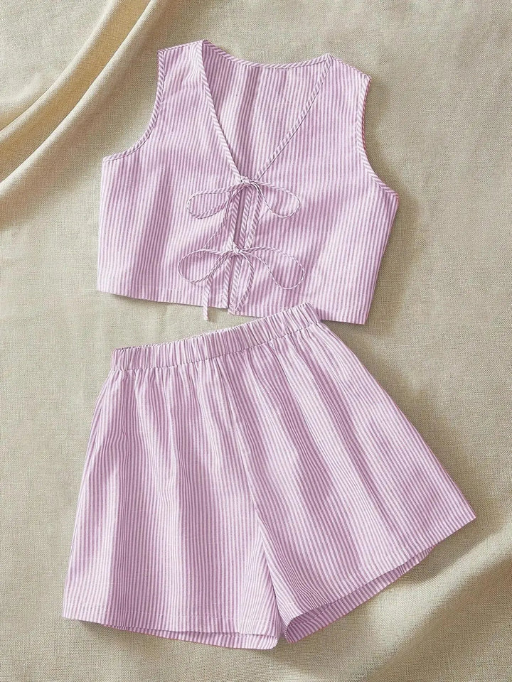 Women's chic striped lounge set, comfortable two-piece with crop top & shorts for relaxed casual wear.
