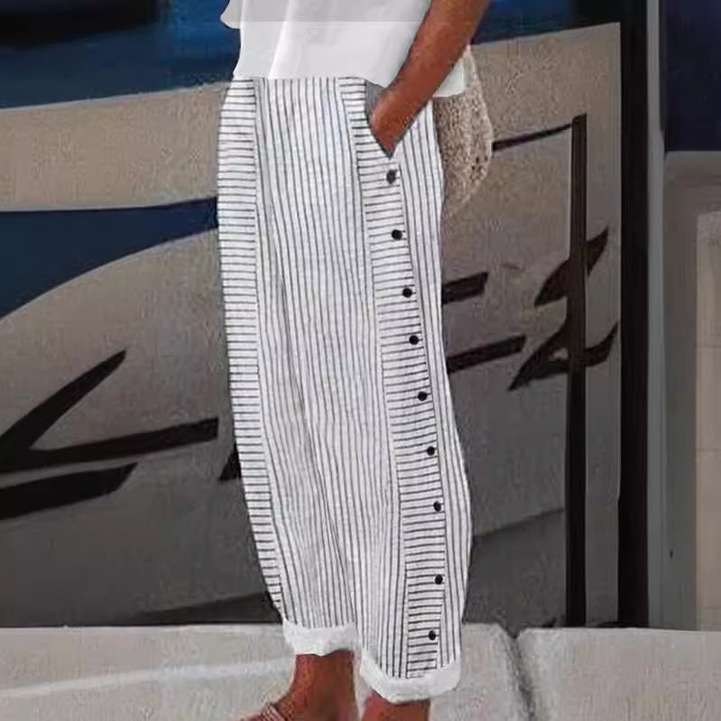 Women's chic striped pants with stylish button accents and an elastic waist for comfortable, relaxed everyday wear.