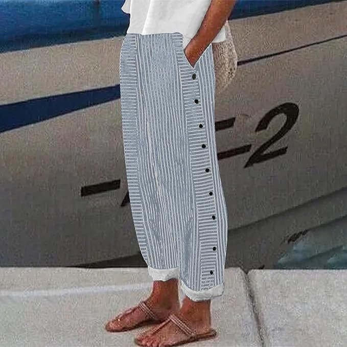 Comfortable women's striped pants. Relaxed fit, elastic waist, and chic button details for casual spring fashion.