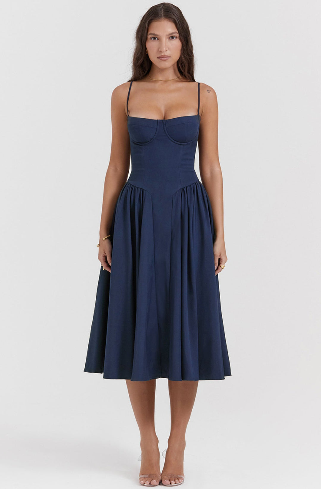 Elegant Mira summer dress featuring a cinched corset waist, spaghetti straps & flared skirt.