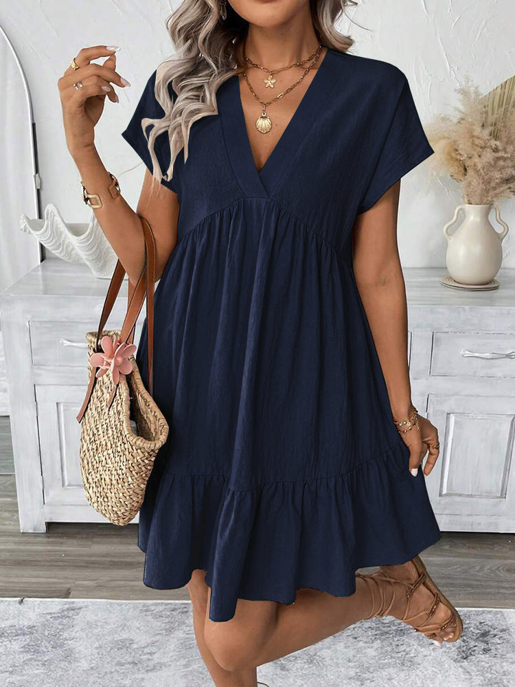Stylish women's ruffled mini dress, ideal for summer, beach, or holiday. Features a flattering V-neck & sleeveless design.