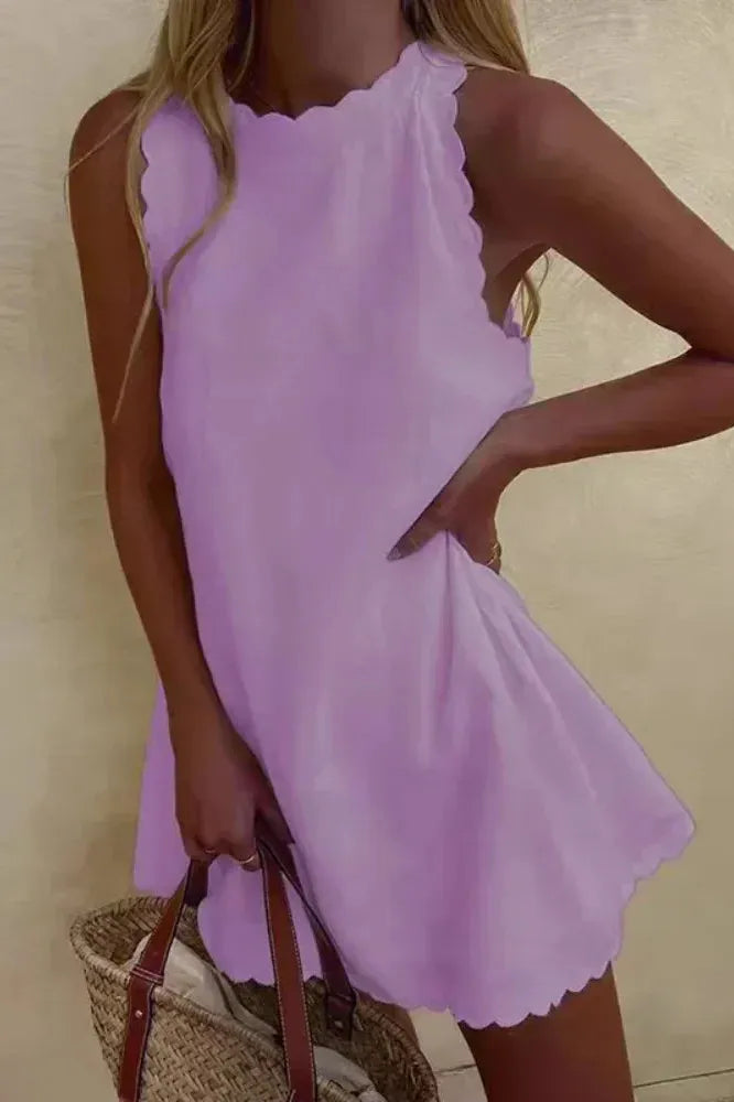 Modern tailored mini dress, an elegant choice for women's party outfits & sophisticated evening wear.