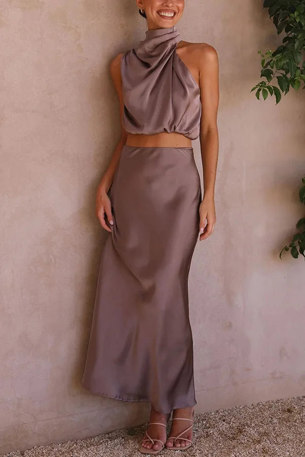 Amelie women's stylish two-piece set: sleeveless top with an asymmetric neckline & elegant skirt.