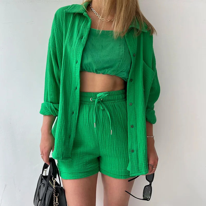 Women's vibrant shorts set, a comfortable button-up top & elastic waist shorts for summer style.