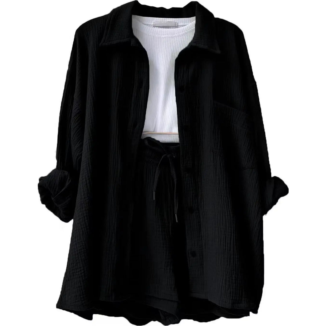 Trendy women's summer two-piece with a chic button-up top & relaxed fit shorts.