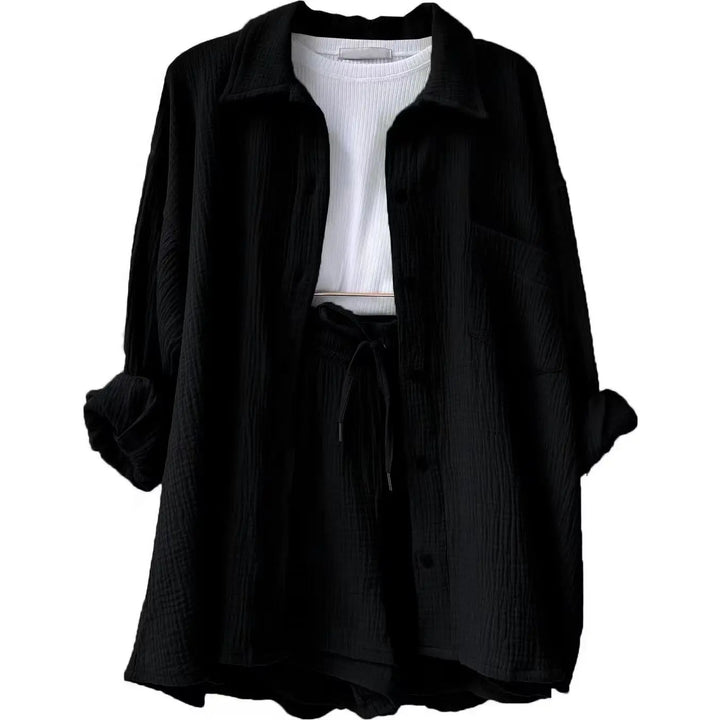 Trendy women's summer two-piece with a chic button-up top & relaxed fit shorts.