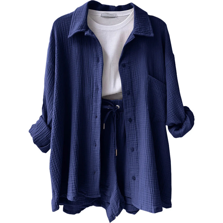 Chic women's two-piece: button-up shirt with rolled sleeves & drawstring shorts for summer.