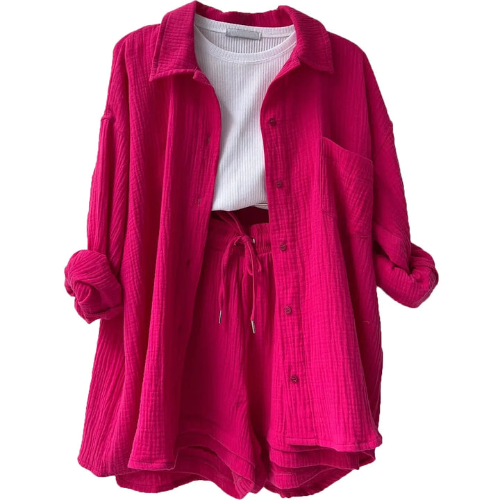 Stylish women's two-piece set, perfect for travel: button-up shirt & relaxed fit shorts.