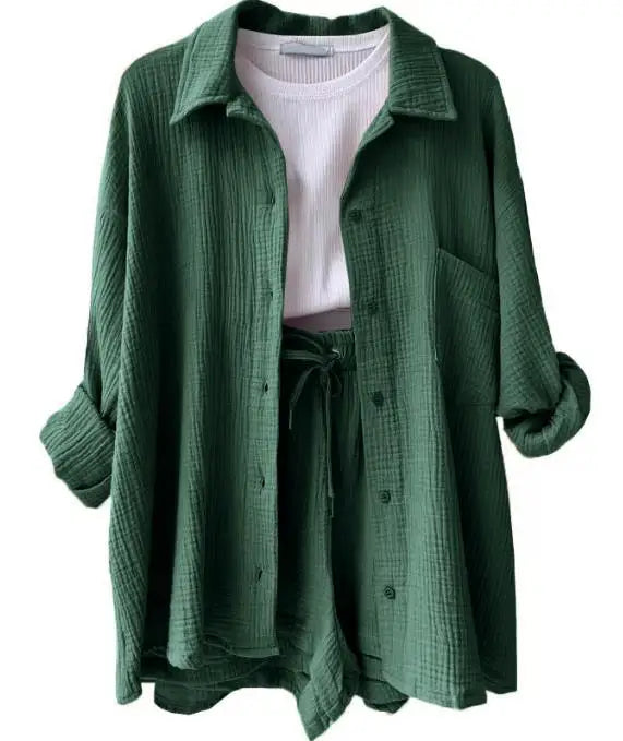 Women's vacation-ready set: stylish button-up shirt & drawstring shorts for beach or resort.