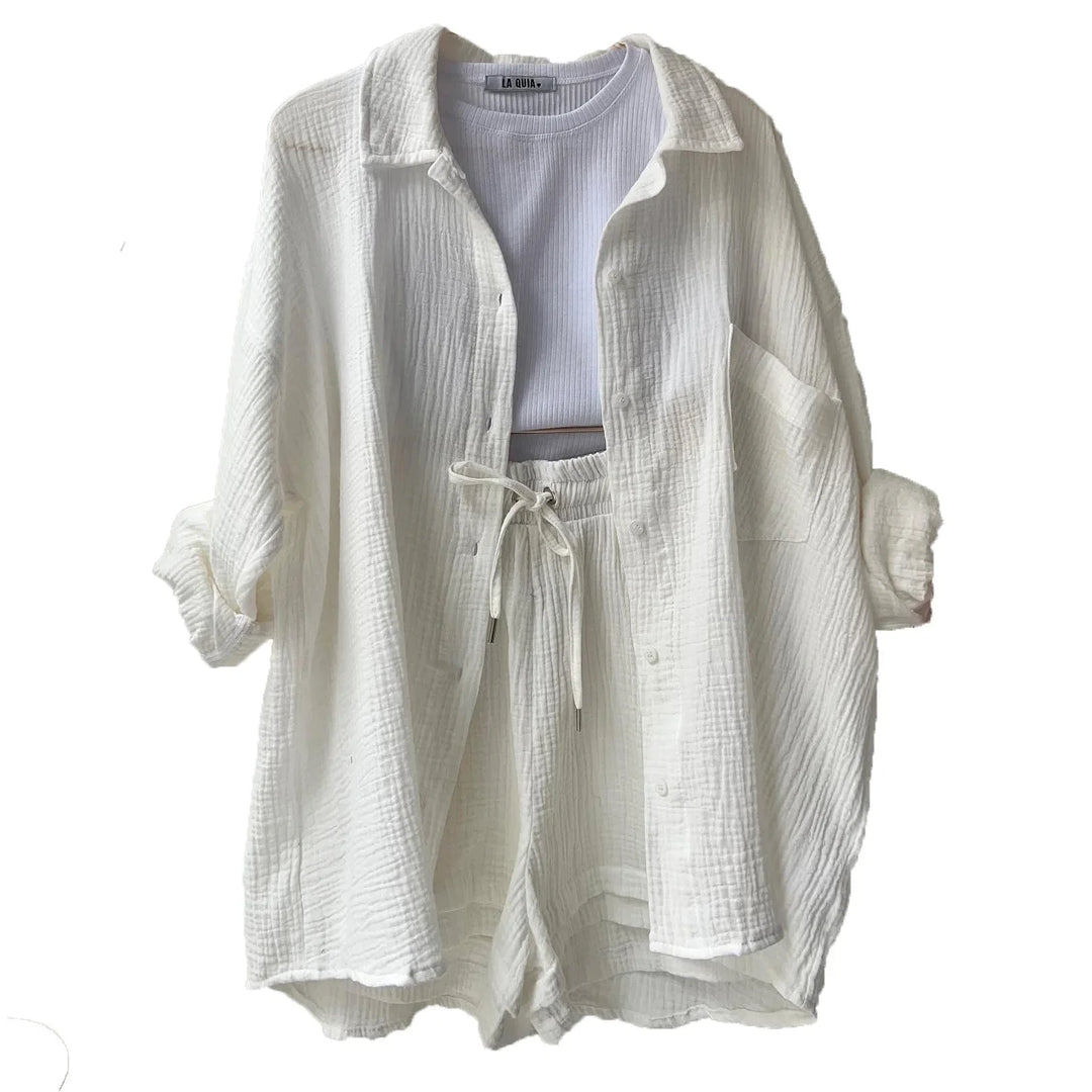 Relaxed women's shorts set, button-up shirt & soft drawstring shorts, ideal for a casual outing.