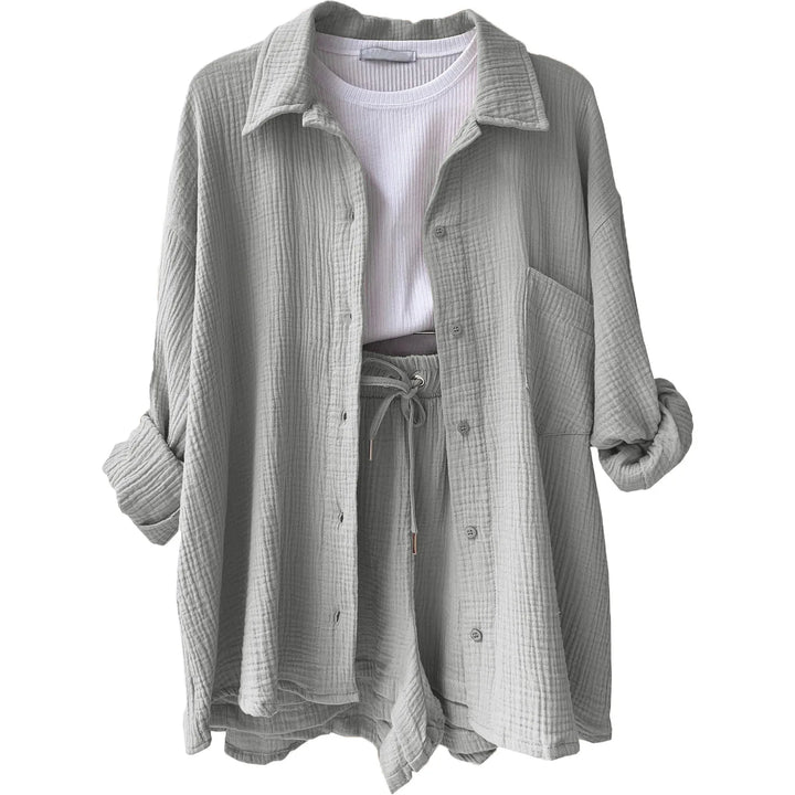Chic women's casual set: button-up shirt & drawstring shorts, a versatile outfit for warm weather.