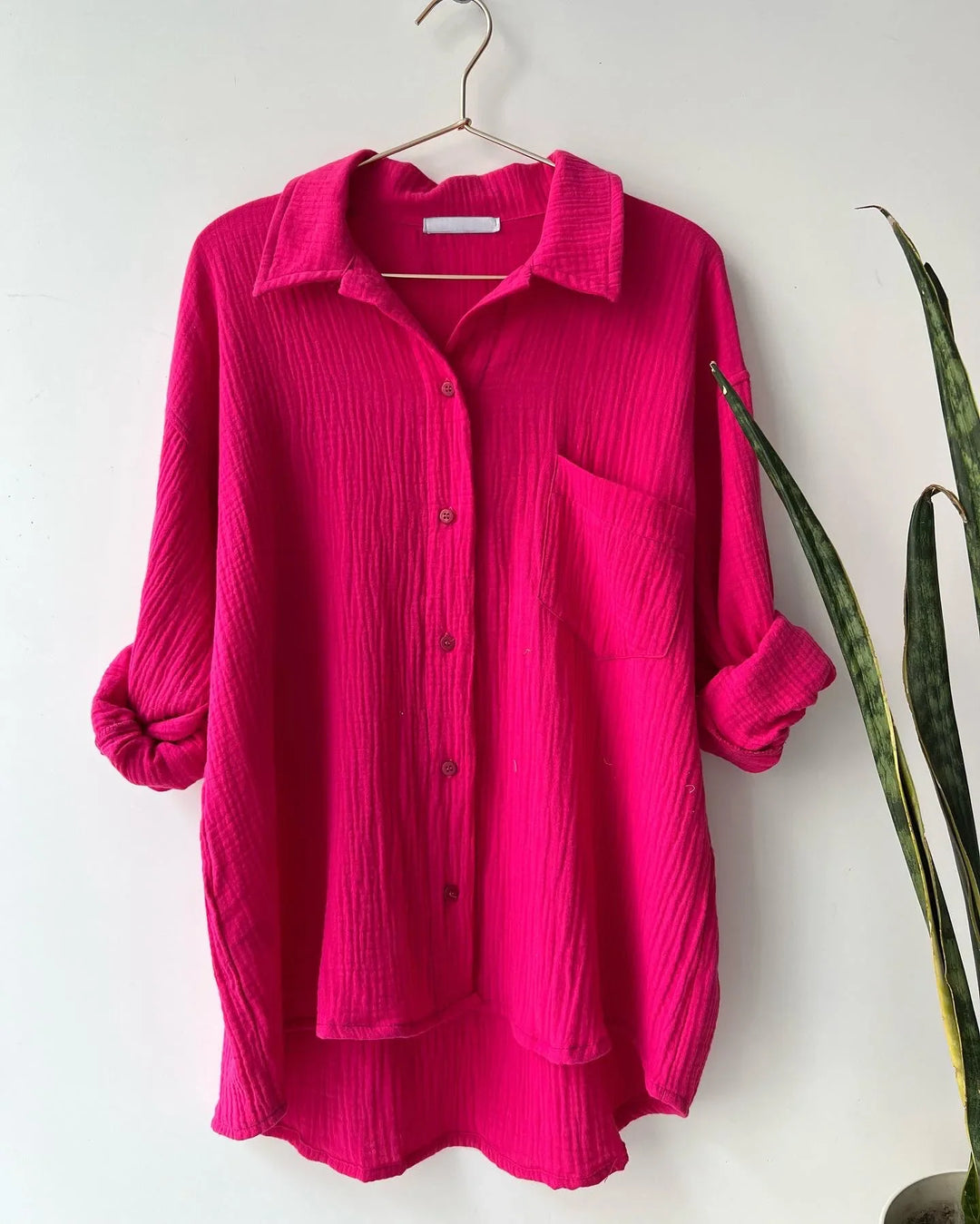 Women's comfort fit two-piece outfit, a button-up shirt & drawstring shorts, great for everyday wear.