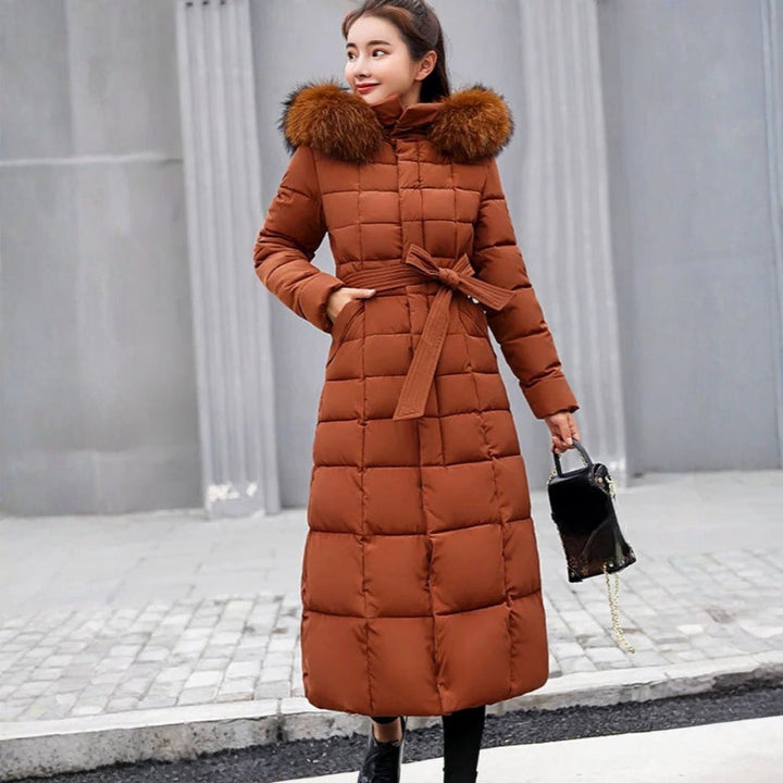 Women's chic warm winter puffer jacket in elegant style, perfect for cold weather fashion.