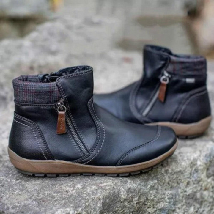 Women's chic waterproof ankle boots. Stylish and comfortable for all-weather fashion. Perfect winter footwear.