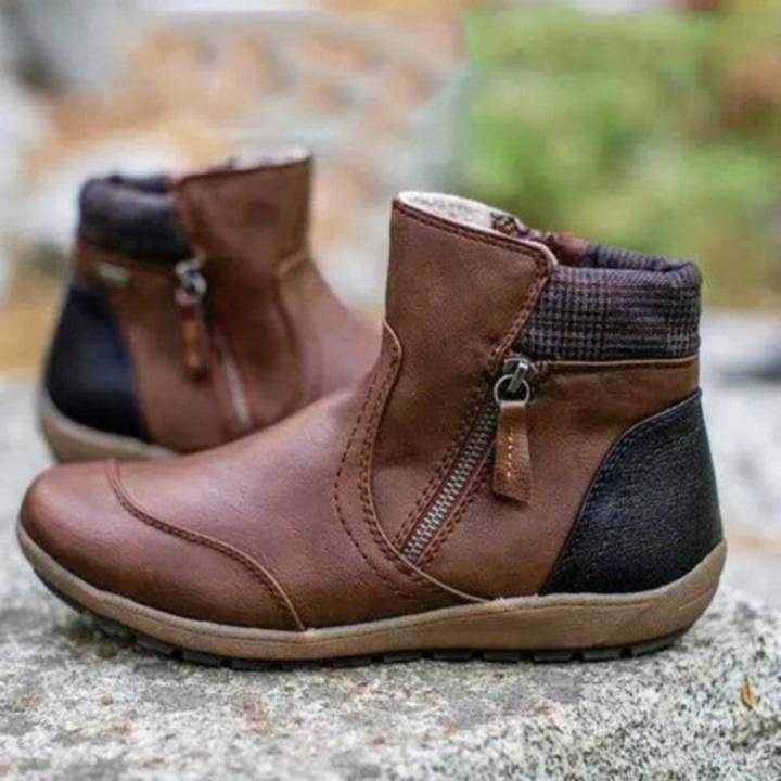 Fashionable women's waterproof ankle boots. Chic and comfortable footwear, perfect for all-weather winter style.