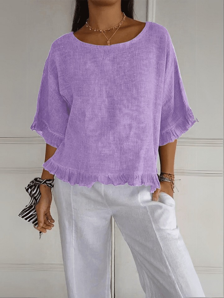 Stylish women's ruffle blouse featuring a lightweight design, perfect for elegant casual wear or office.