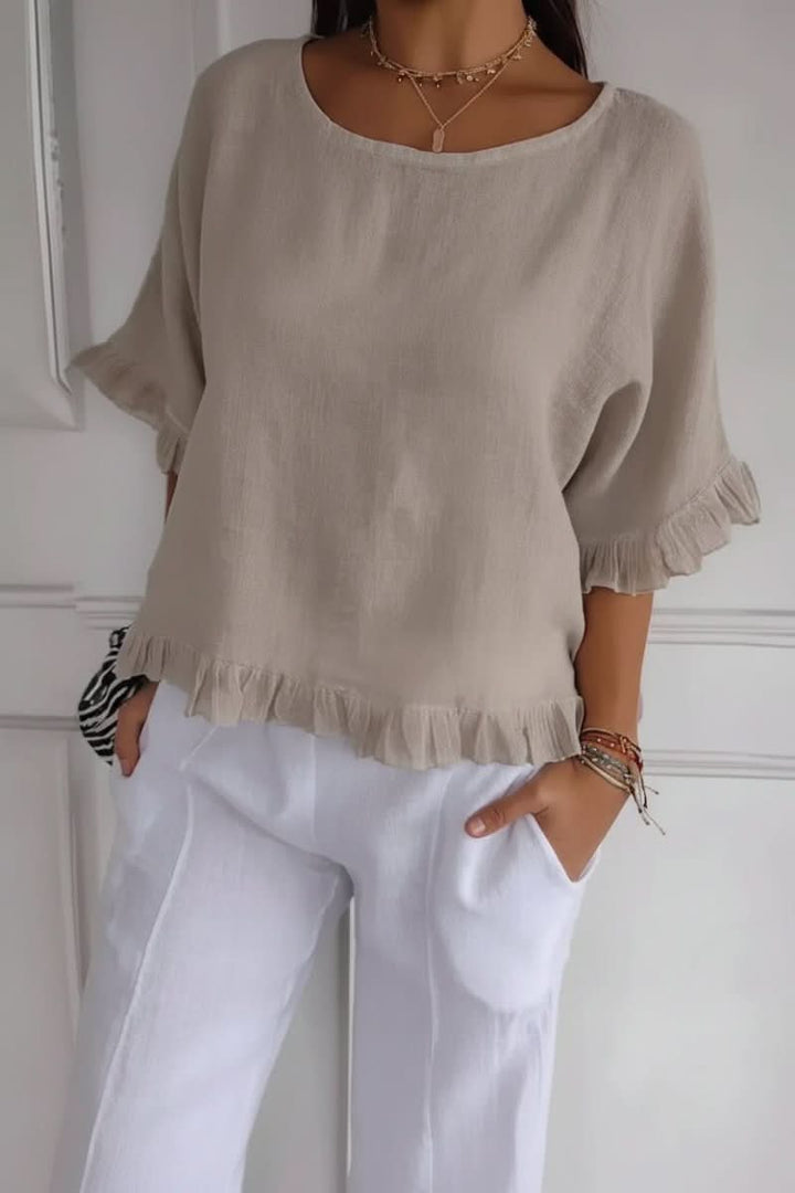 Effortless chic women's ruffle blouse, a lightweight elegant shirt perfect for versatile casual and office style.