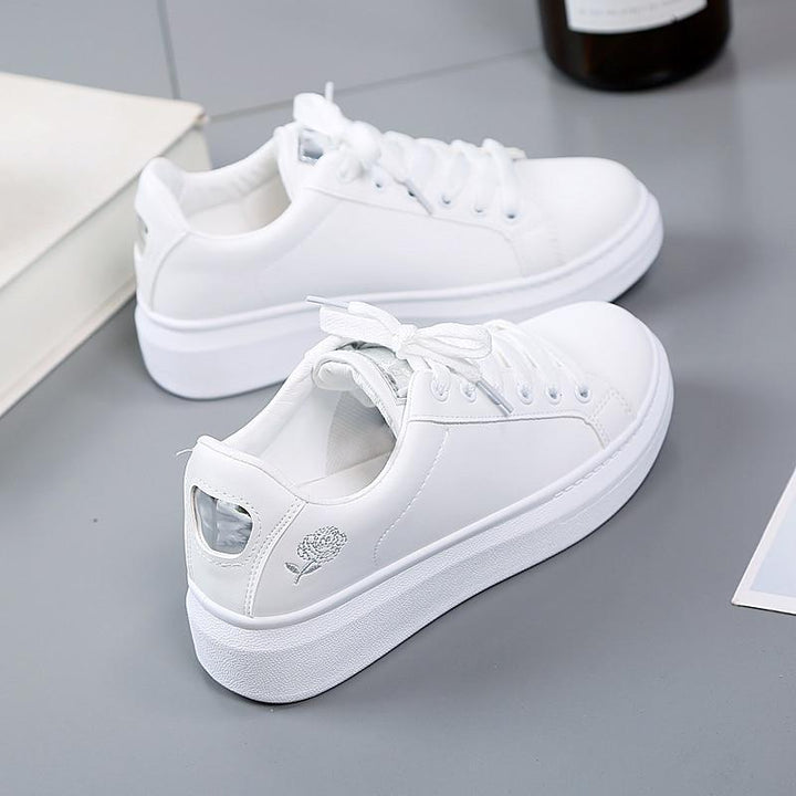 Trendy women's faux leather sneakers, Norell, featuring stylish metallic accents for a sporty chic look.