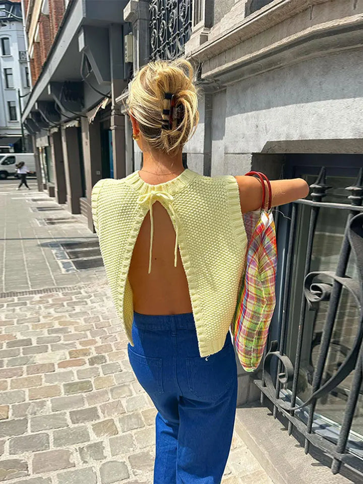Women's chic yellow sleeveless knit top, lightweight & flattering for summer fashion. Perfect casual wear with a round neck.