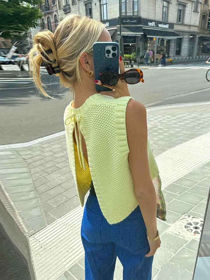 Flattering women's yellow sleeveless top, comfortable & versatile. A chic summer essential for casual wear with a round neck.